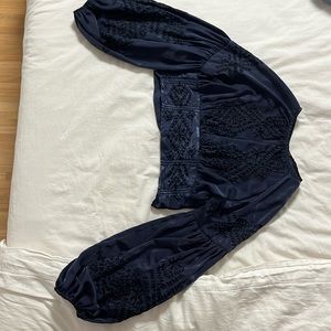 Free People open back, embroidered top.